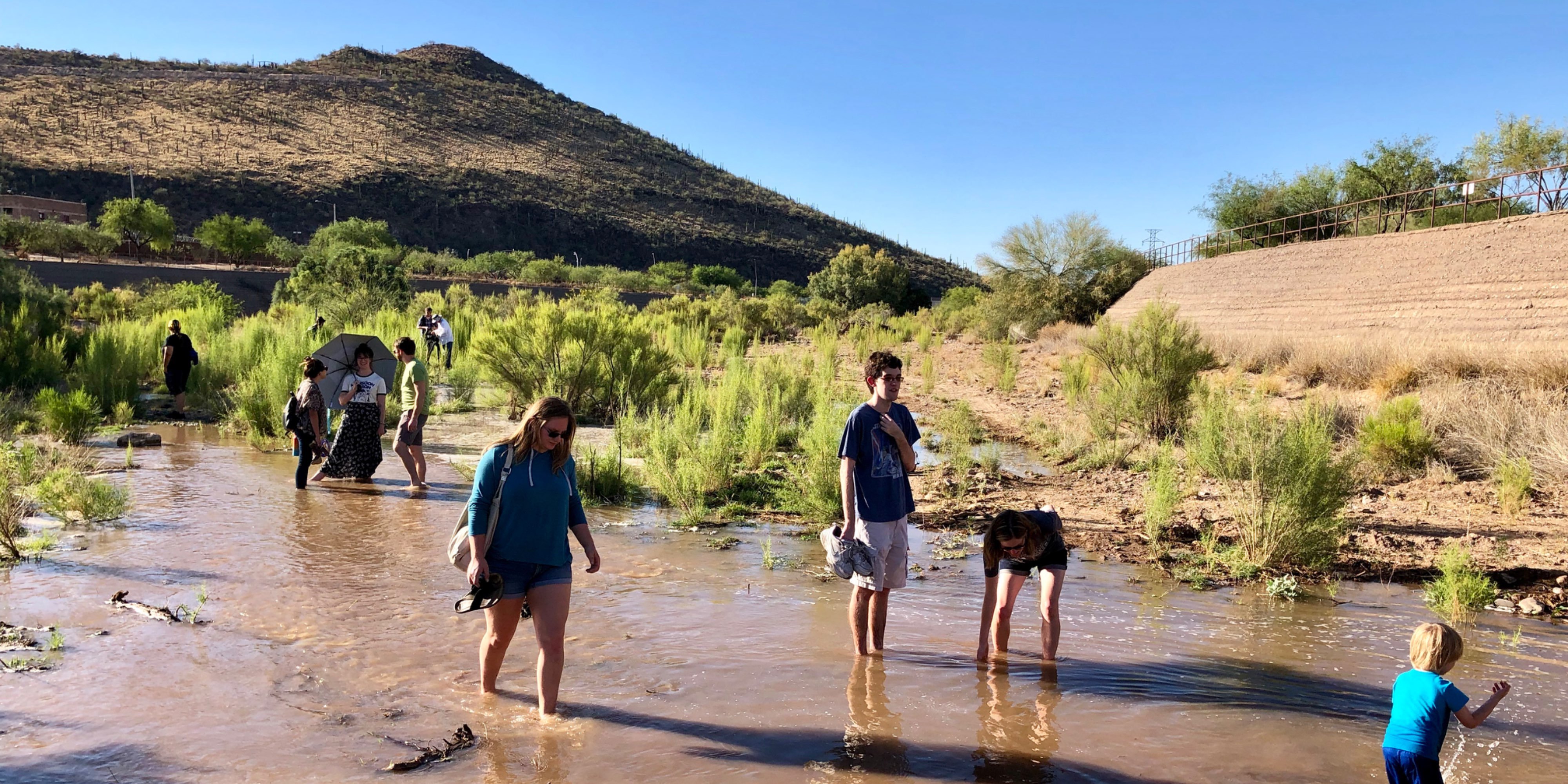 Tucson, Arizona citizens gathering in water