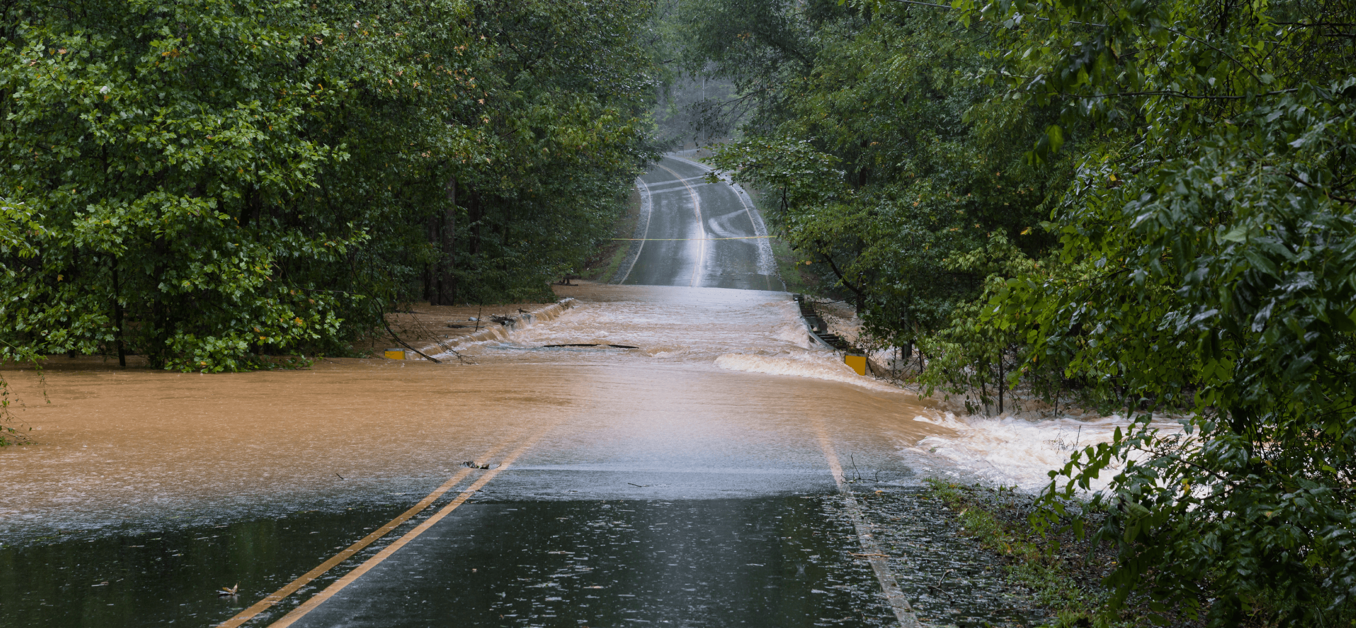 DisasterReliefPage_2672x1238_Florence_FloodedRoad-compressor (1).png