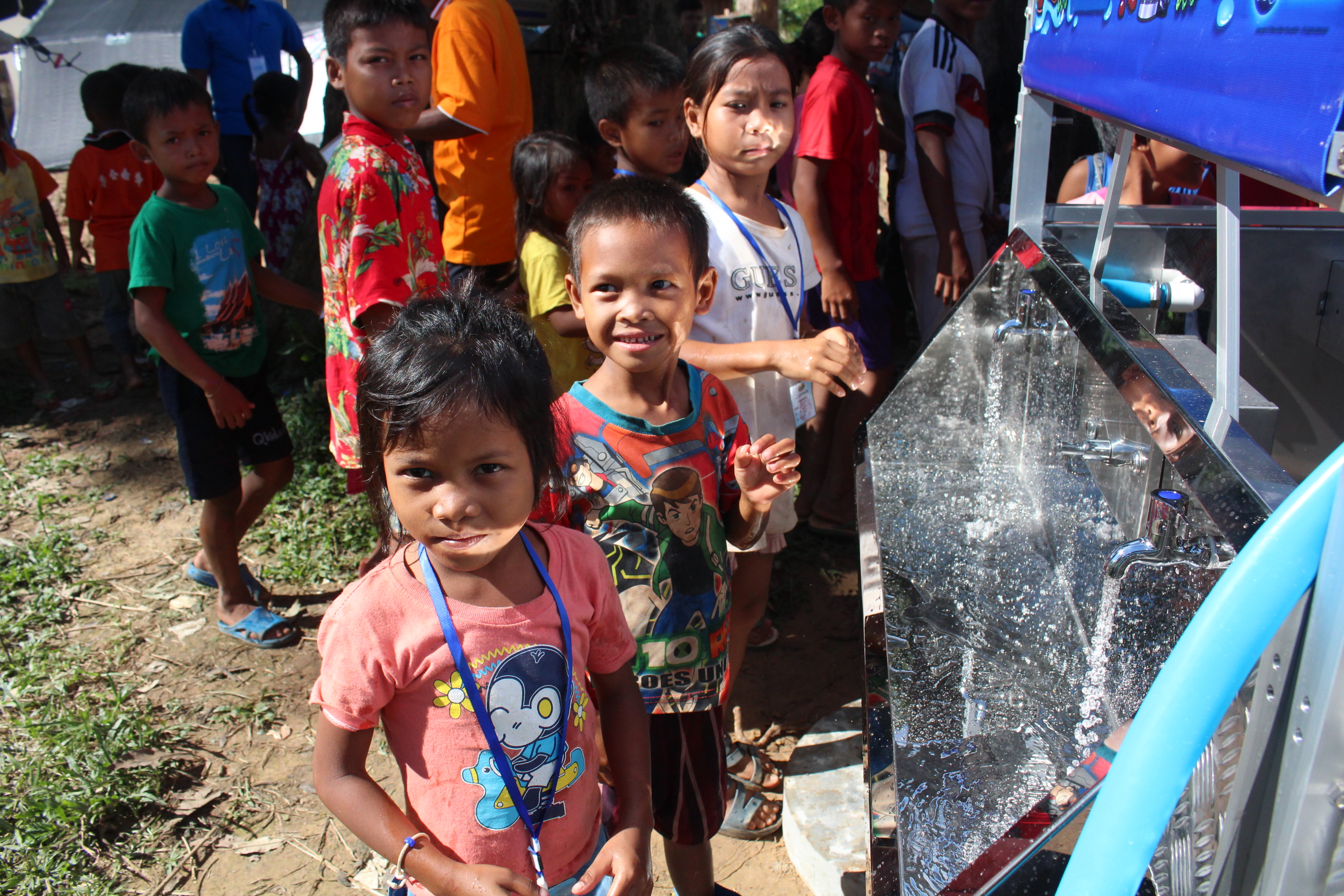 Laos kids at water tower.jpg